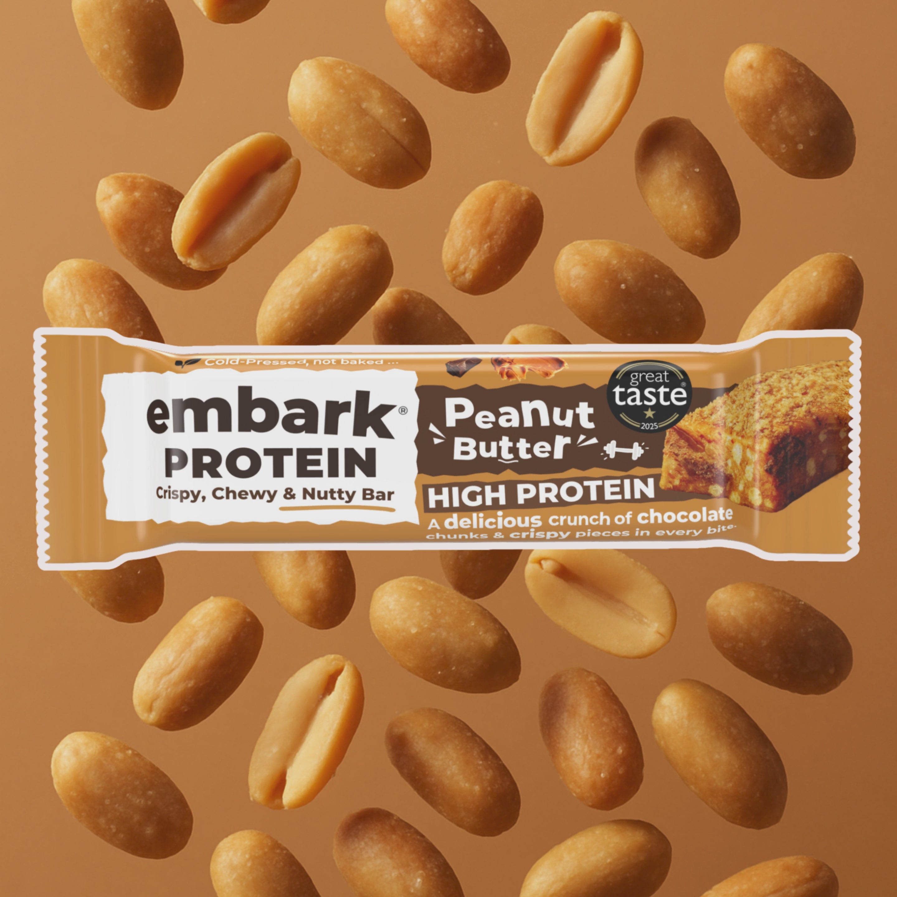 Load video: Peanut &amp; Rock Salt protein bar in a background of roasted peanut halves